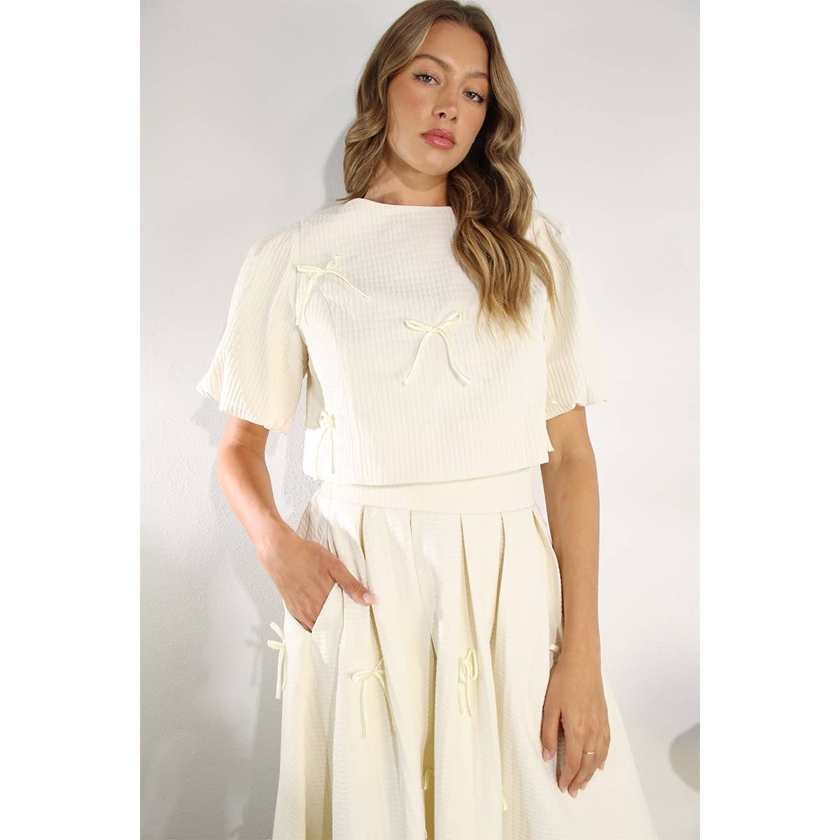 BOW EMBLLISHED TEXTURED TOP AND SKIRTS SET: OFF WHITE