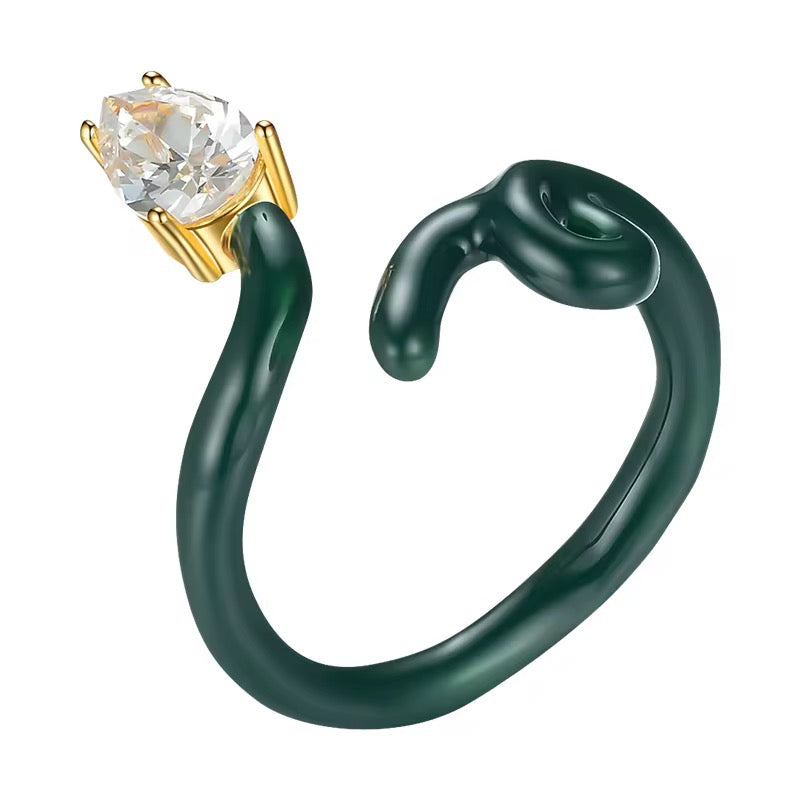 Green and white abstract ring