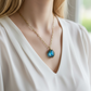 light blue oval necklace