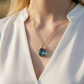 light blue oval necklace