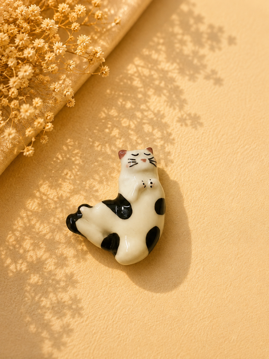 Lounging Spotted Cat Ceramic Brooch